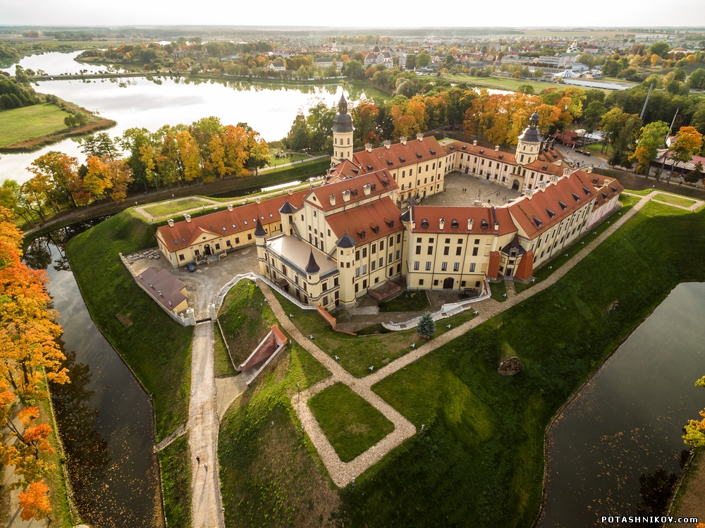Castle in Nesvizh from the height of a drone. Taking pictures with quadrocopters in Minsk in Belarus. Aerial survey in Minsk. Fl